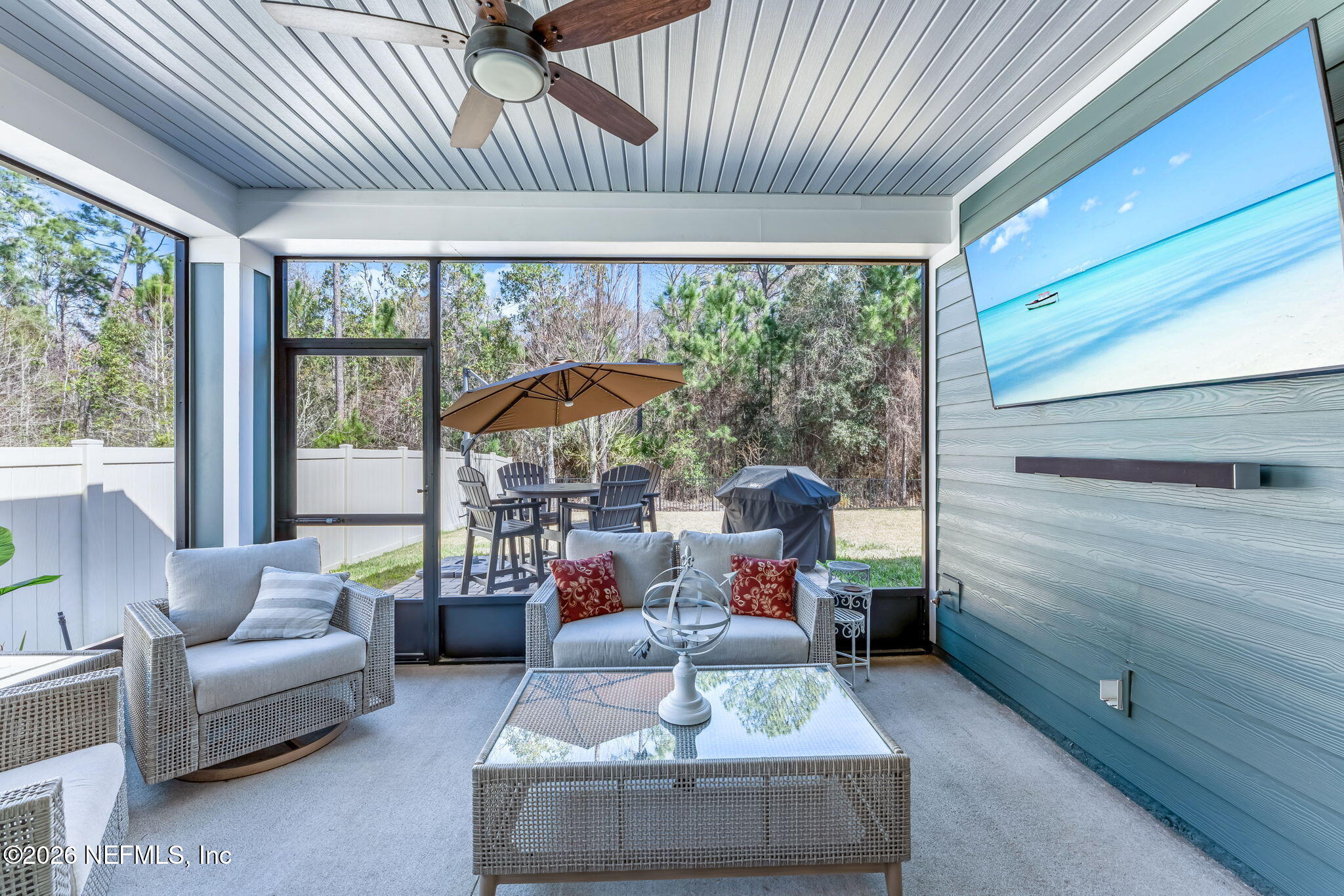 175 Convex Lane St. Augustine, FL 32095 - Photo 50 of 66 a living room with furniture and a large window
