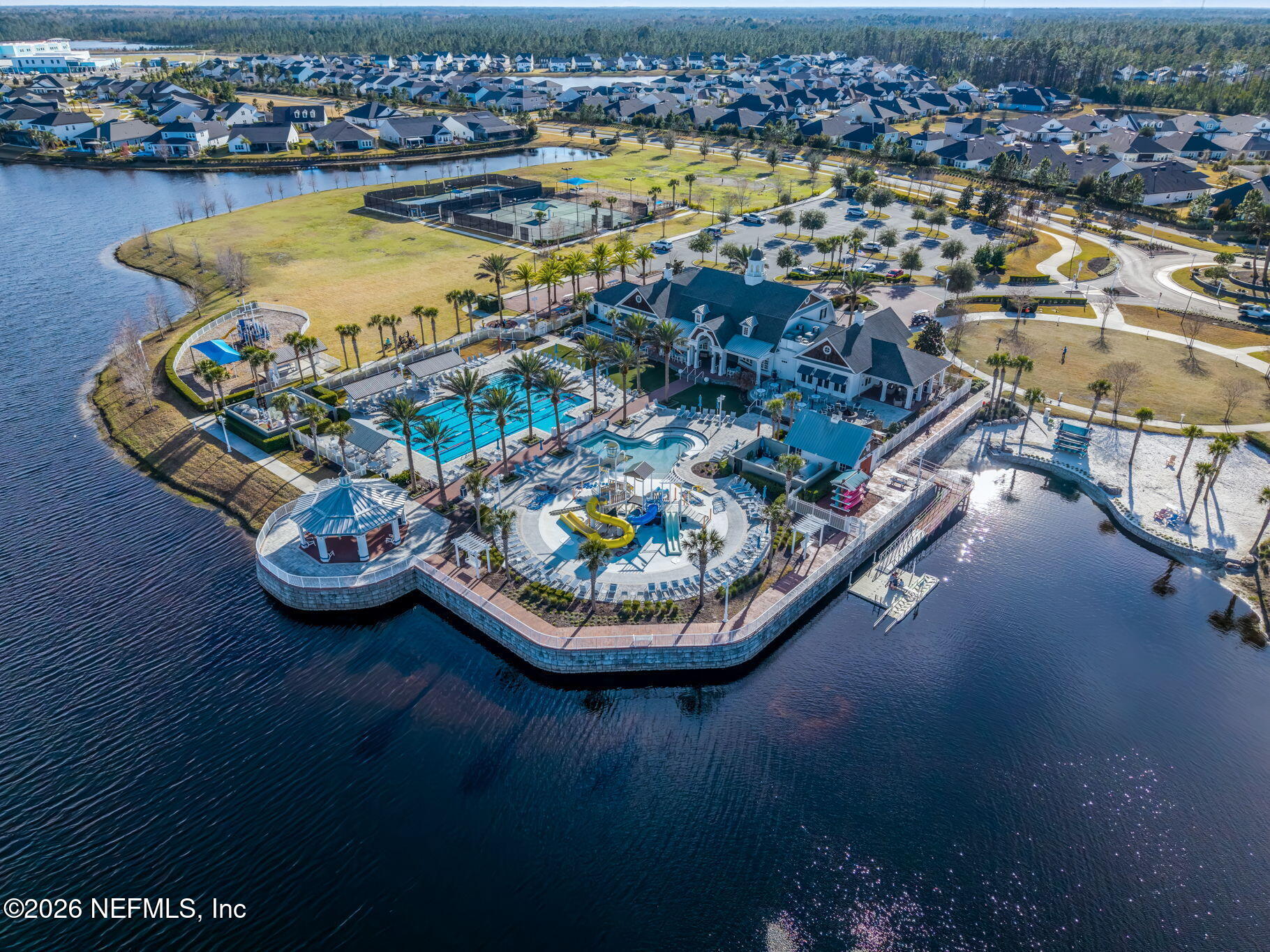 175 Convex Lane St. Augustine, FL 32095 - Photo 63 of 66 an aerial view of a house with swimming pool tennis courts and ocean view