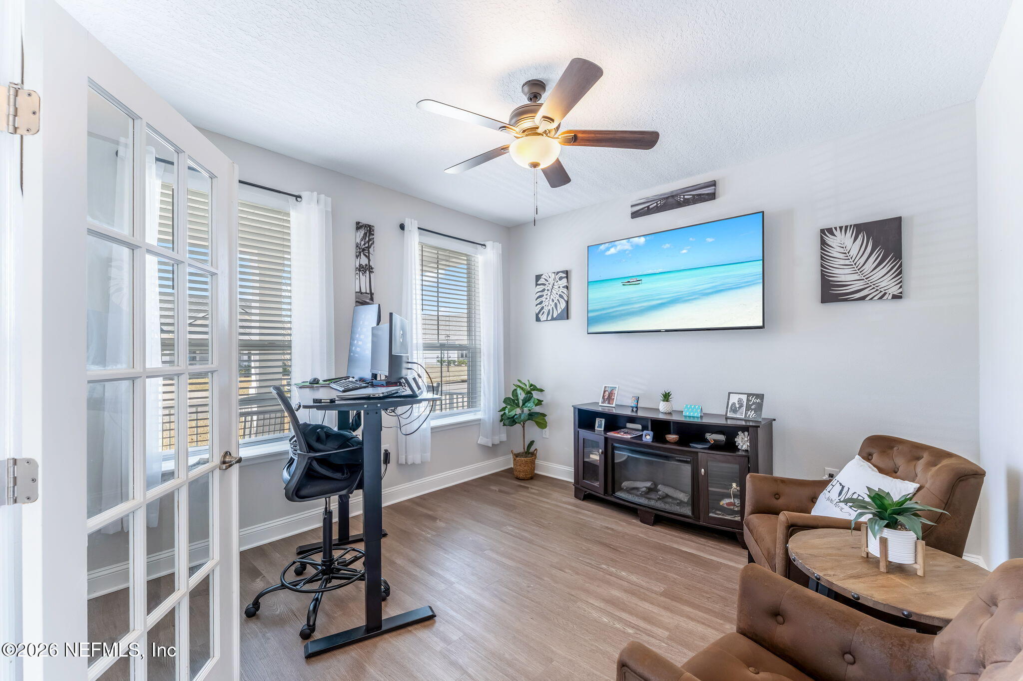 175 Convex Lane St. Augustine, FL 32095 - Photo 10 of 66 a living room with furniture and floor to ceiling window