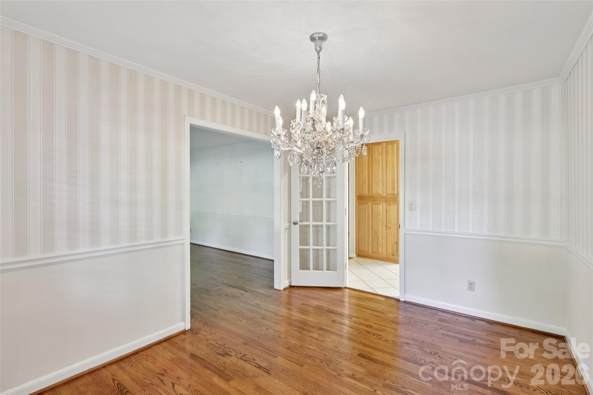 1002 Ridge Street Albemarle, NC 28001 - Photo 10 of 45 a view of a chandelier in a room