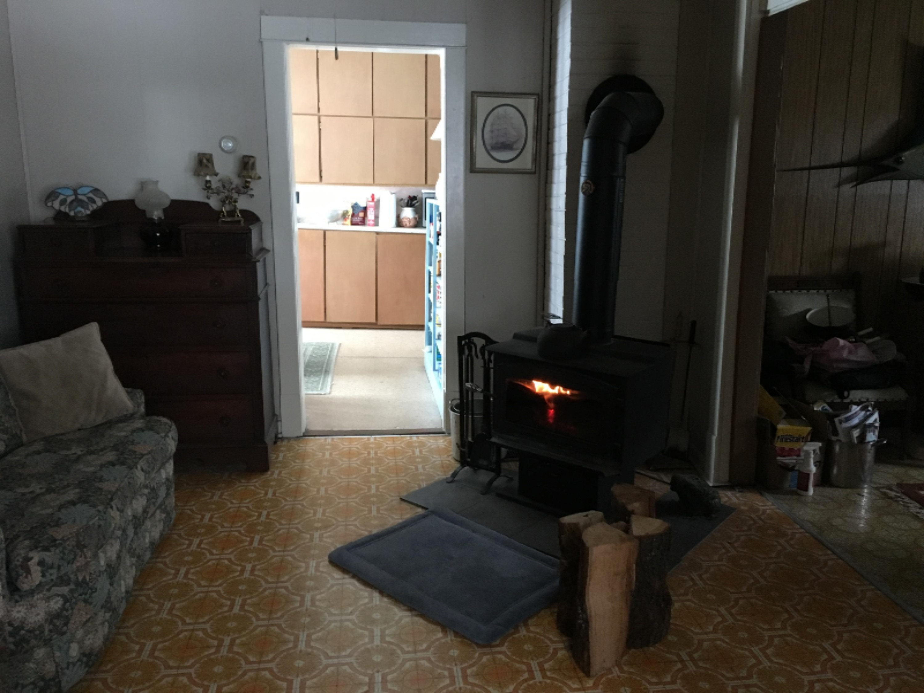 9199 Holso Road Kaleva, MI 49645 - Photo 7 of 22 Dining Room with Wood Stove