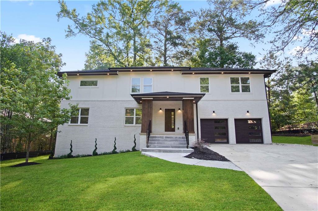 320 Kelso Drive Southwest Atlanta, GA 30311 - Photo 1 of 1 front view of house with a yard