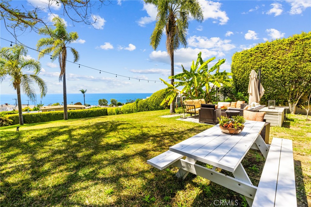 770 Hillcrest Drive, Unit 7 Laguna Beach, CA 92651 - Photo 28 of 30 a view of an outdoor space with seating area