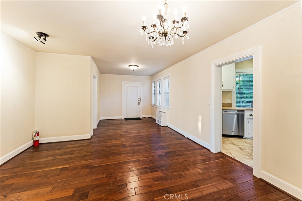 770 Hillcrest Drive, Unit 7 Laguna Beach, CA 92651 - Photo 4 of 30 a view of empty room with wooden floor