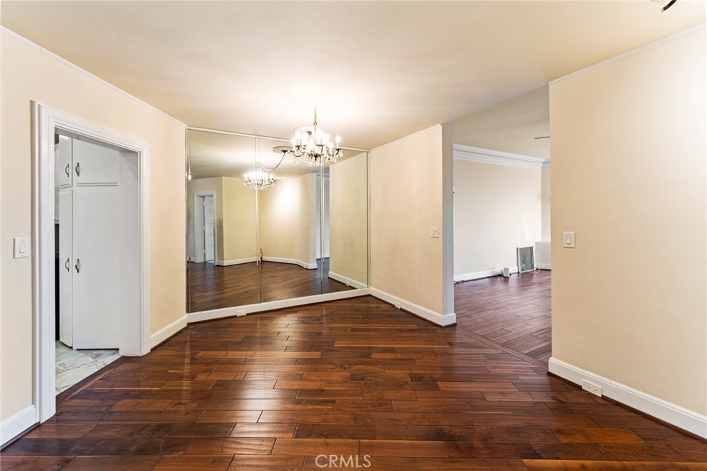 770 Hillcrest Drive, Unit 7 Laguna Beach, CA 92651 - Photo 6 of 30 a view of a room with wooden floor