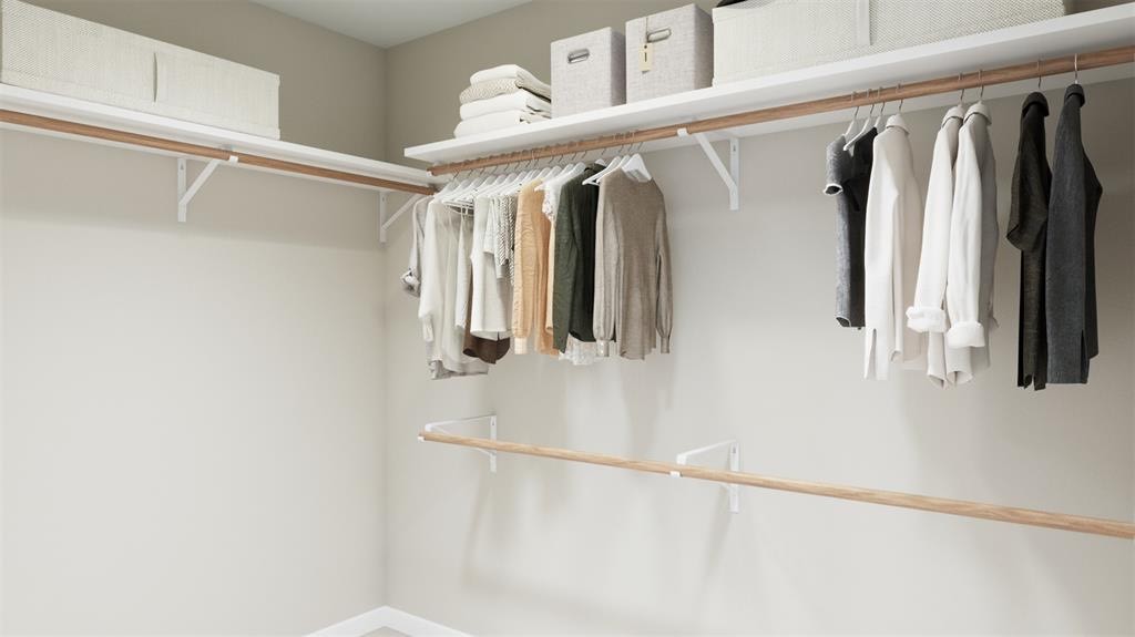 2255 Middle Rdg Drive Conroe, TX 77301 - Photo 10 of 17 a view of walk in closet with clothes and shoes