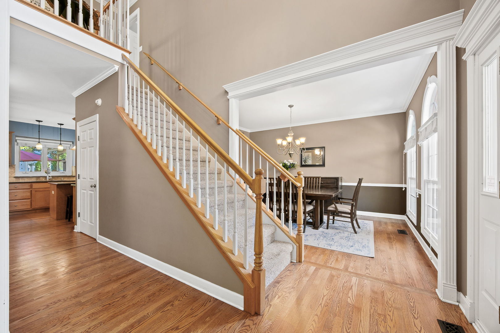2816 Cordgrass Road Naperville, IL 60564 - Photo 2 of 49 a view of a hallway with furniture and entryway