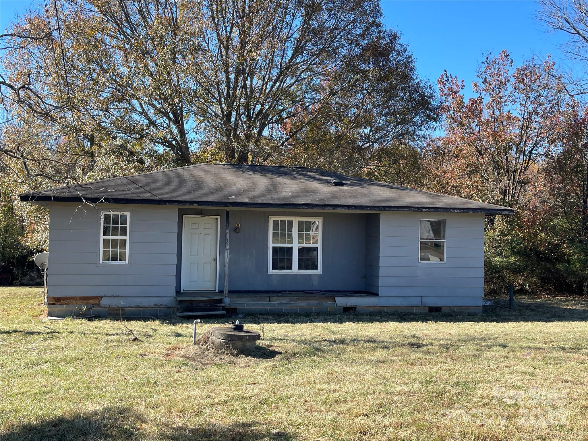 5735 Fallston Road Lawndale, NC 28090 - Photo 2 of 17 a front view of a house with a yard