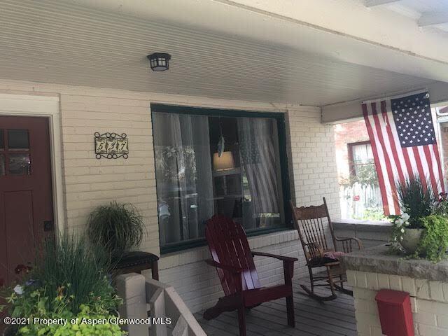 537 East Avenue Rifle, CO 81650 - Photo 5 of 25 a view of balcony with furniture and garden