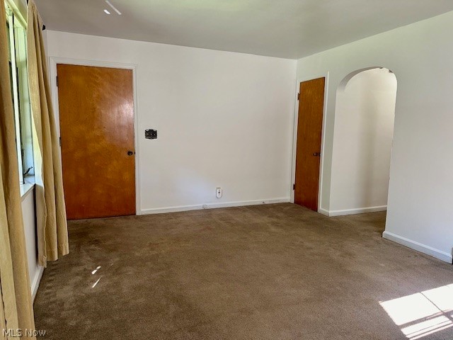 751 Thayer Street, Unit DOWN Akron, OH 44310 - Photo 5 of 25 Unfurnished room featuring light colored carpet