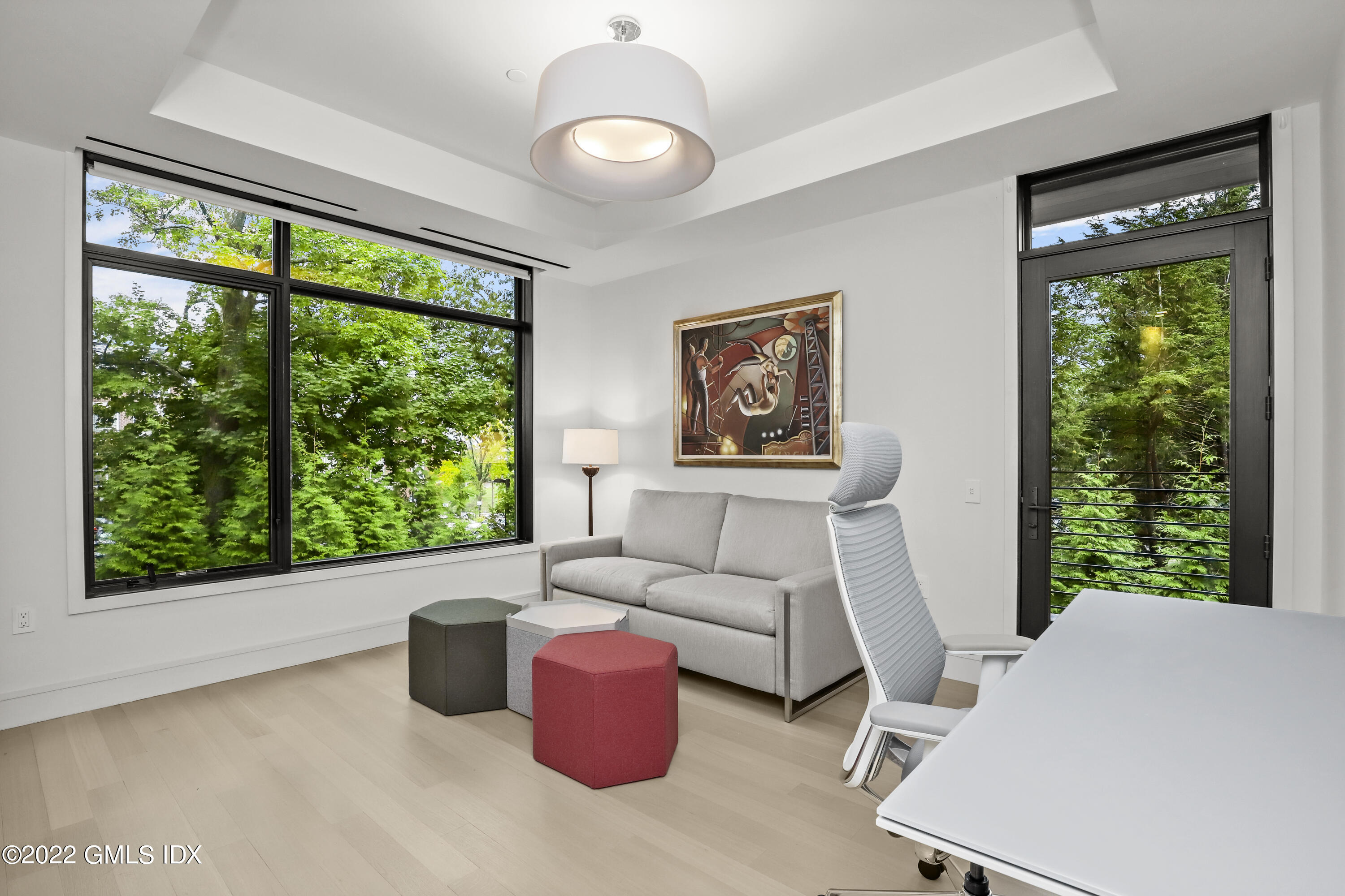 125 Field Point Road, Unit A4 Greenwich, CT 06830 - Photo 20 of 33 a living room with furniture and a large window
