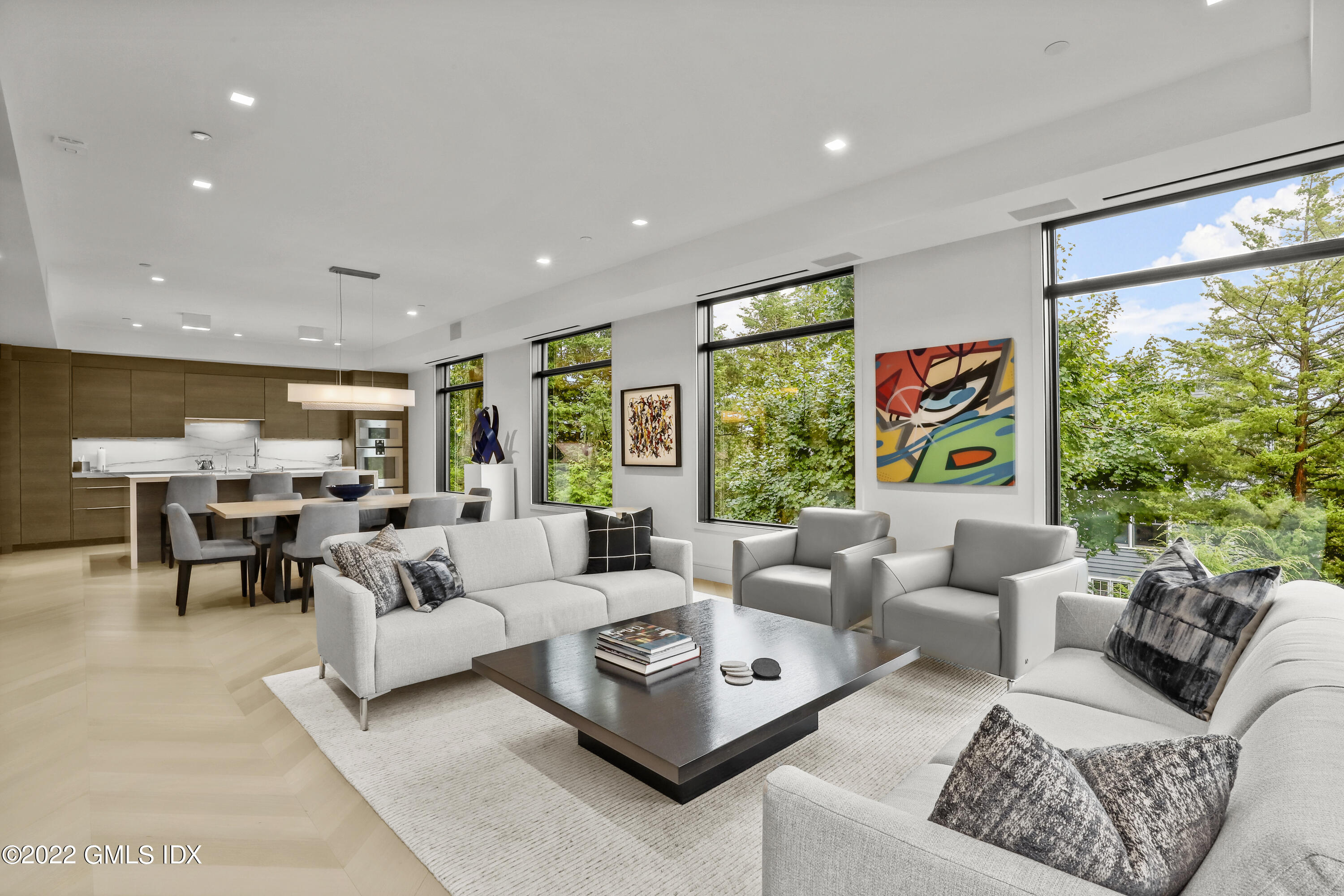 125 Field Point Road, Unit A4 Greenwich, CT 06830 - Photo 2 of 33 a living room with furniture and a large window