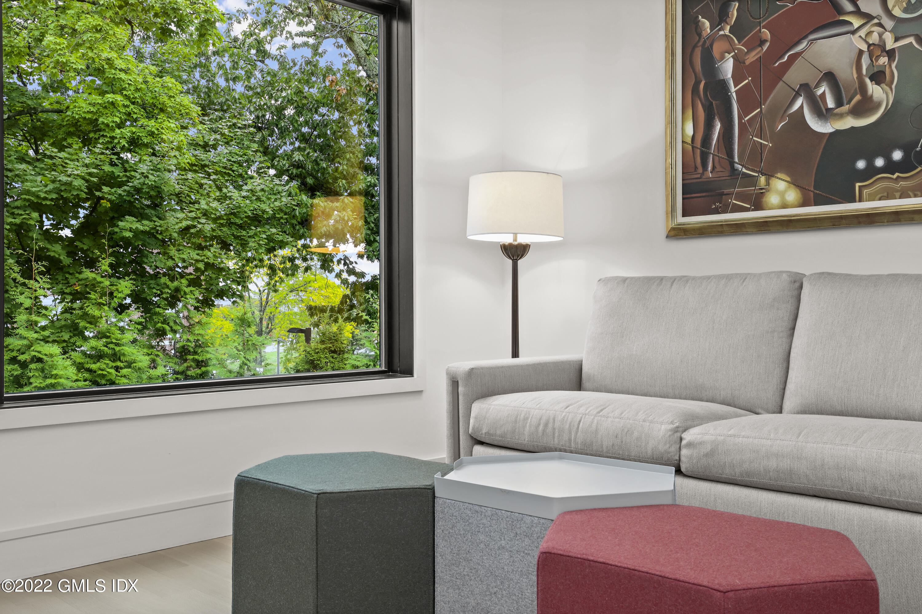 125 Field Point Road, Unit A4 Greenwich, CT 06830 - Photo 21 of 33 a living room with furniture and a window