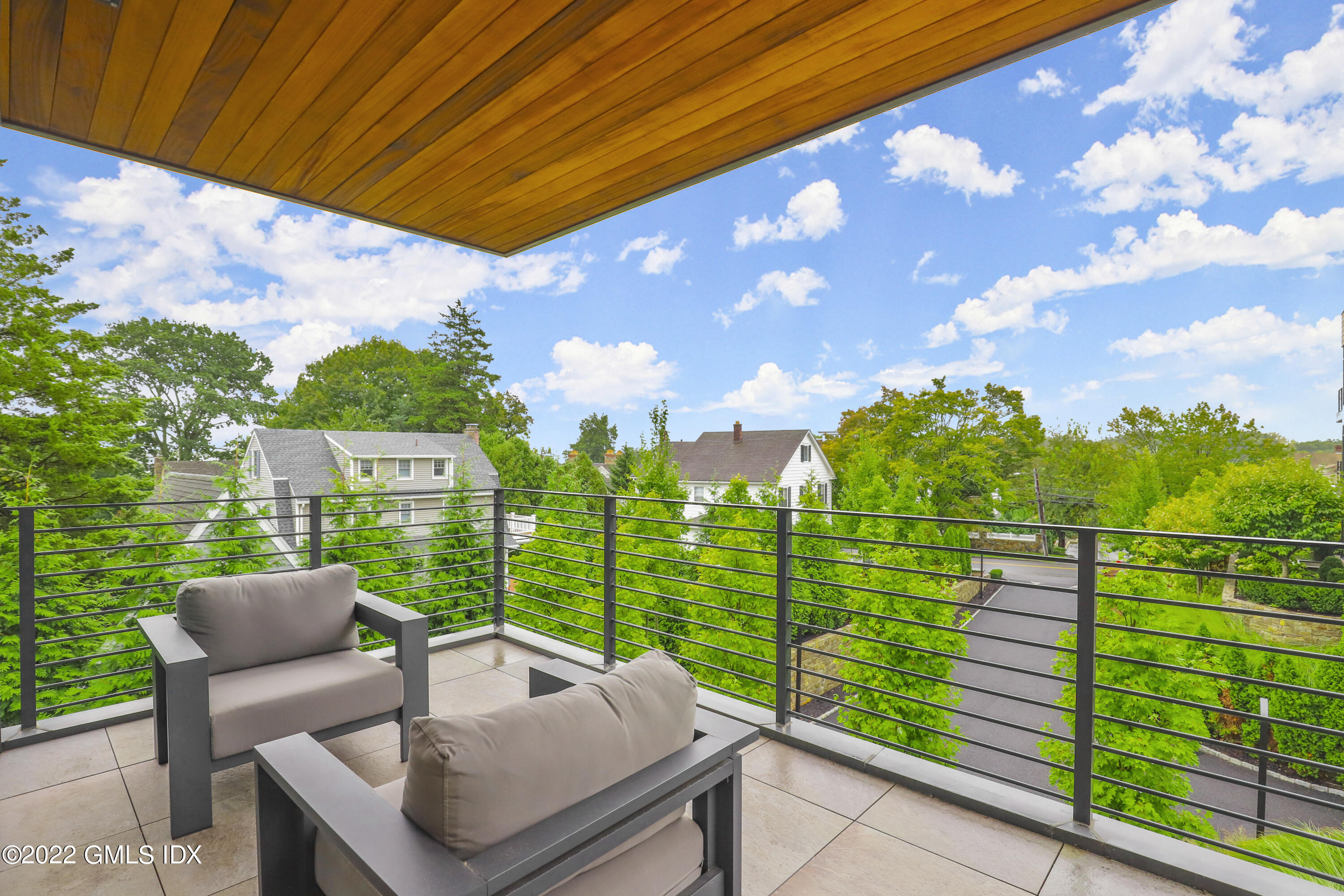 125 Field Point Road, Unit A4 Greenwich, CT 06830 - Photo 24 of 33 a view of a patio with iron fence