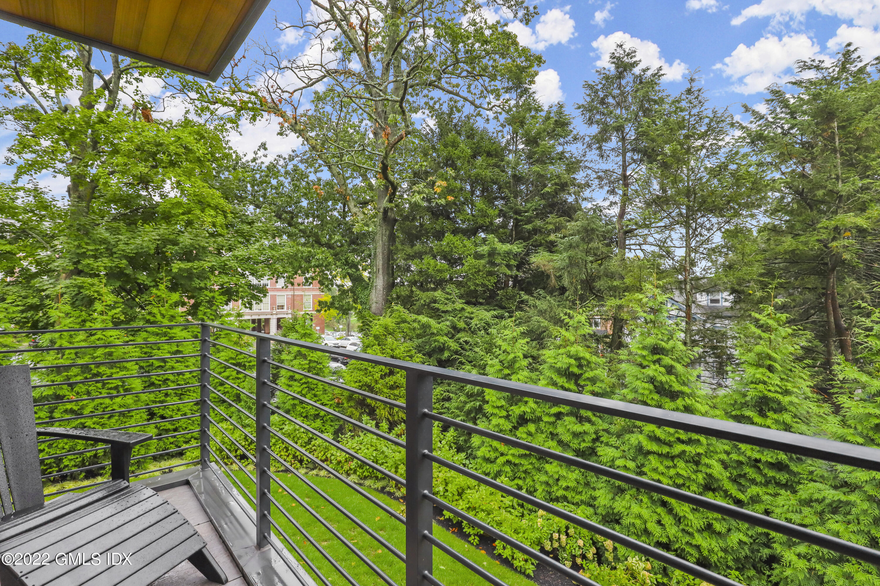 125 Field Point Road, Unit A4 Greenwich, CT 06830 - Photo 25 of 33 a view of a balcony with an outdoor space