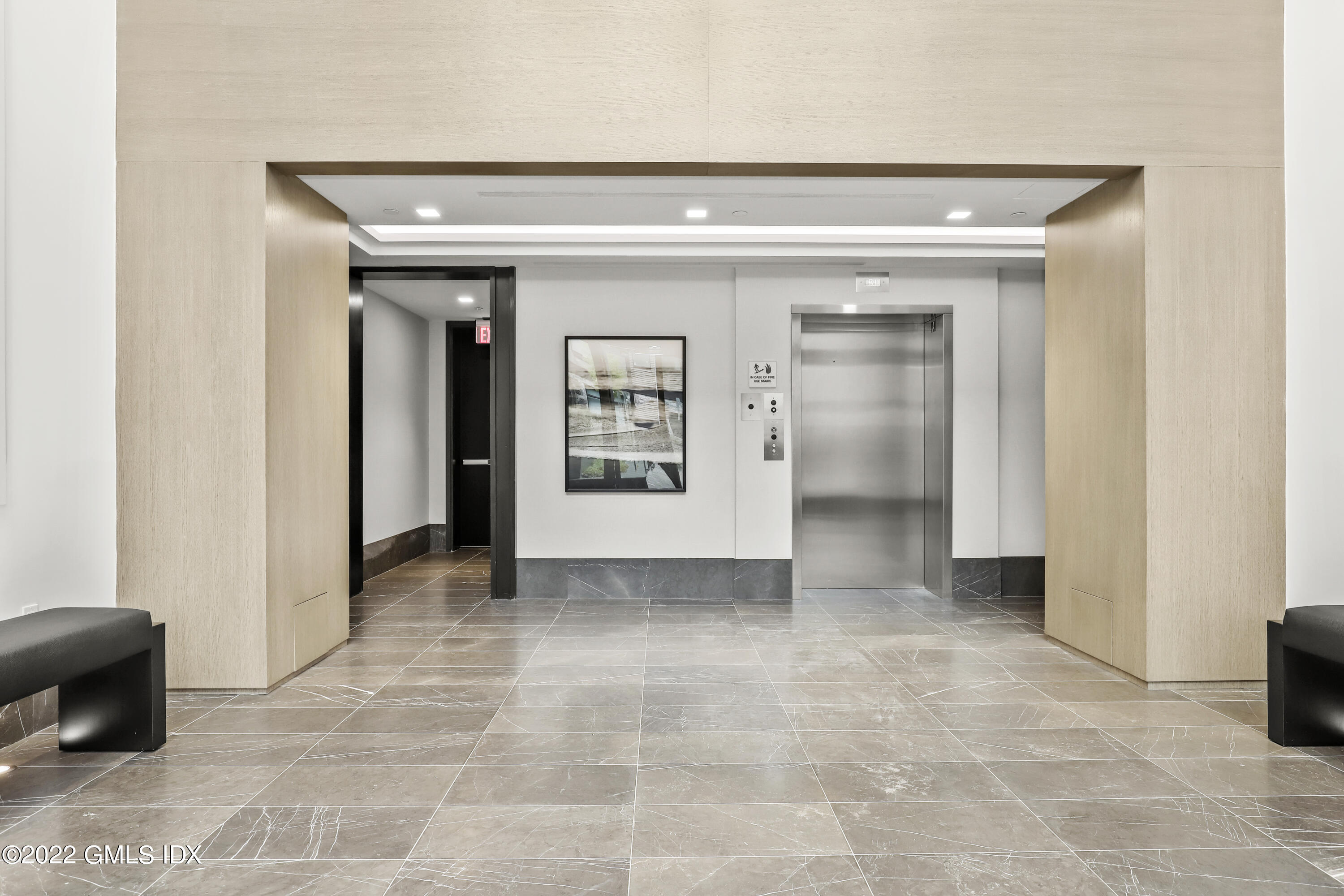 125 Field Point Road, Unit A4 Greenwich, CT 06830 - Photo 27 of 33 a view of a hallway with some storage area