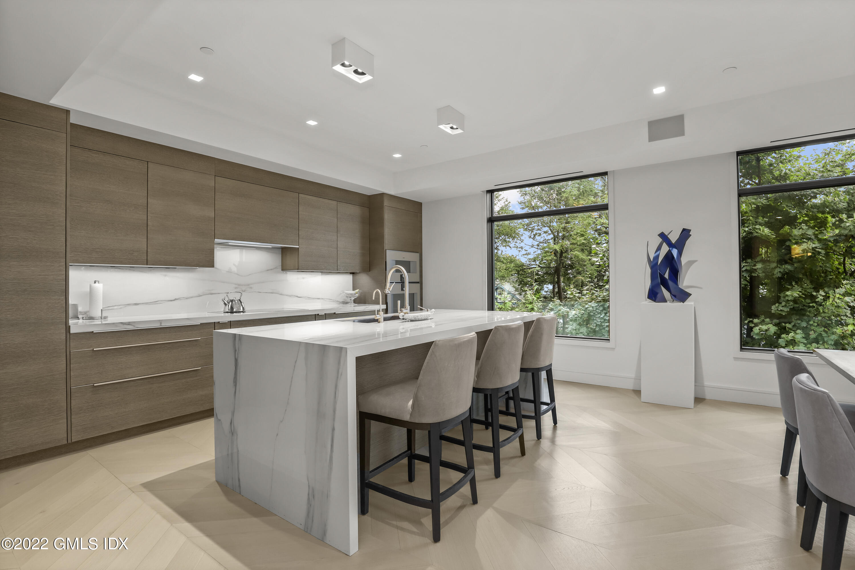 125 Field Point Road, Unit A4 Greenwich, CT 06830 - Photo 8 of 33 a kitchen with appliances cabinets and a sink