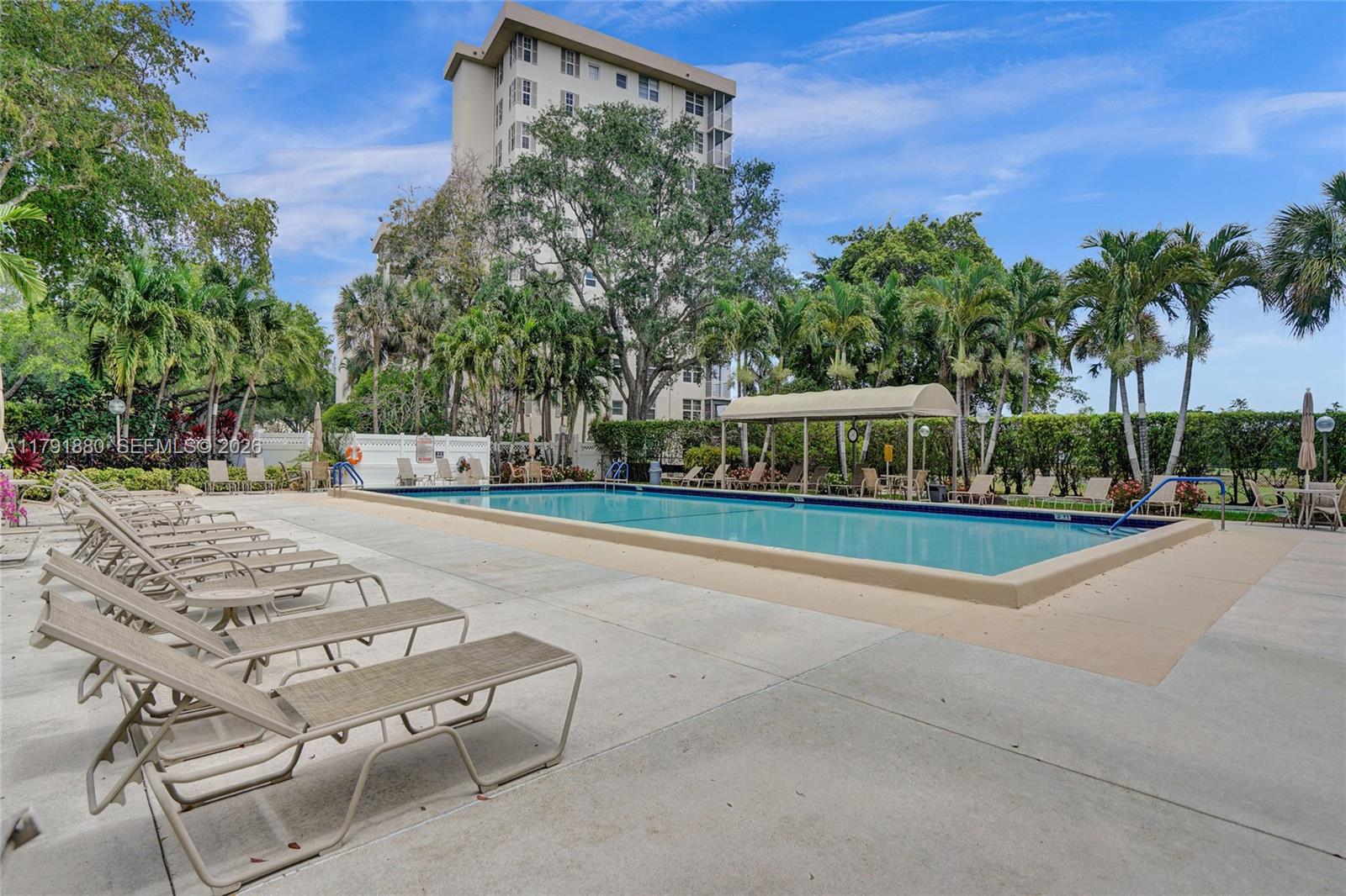 3520 Oaks Way, Unit 308 Pompano Beach, FL 33069 - Photo 33 of 40 a view of a city with tall buildings