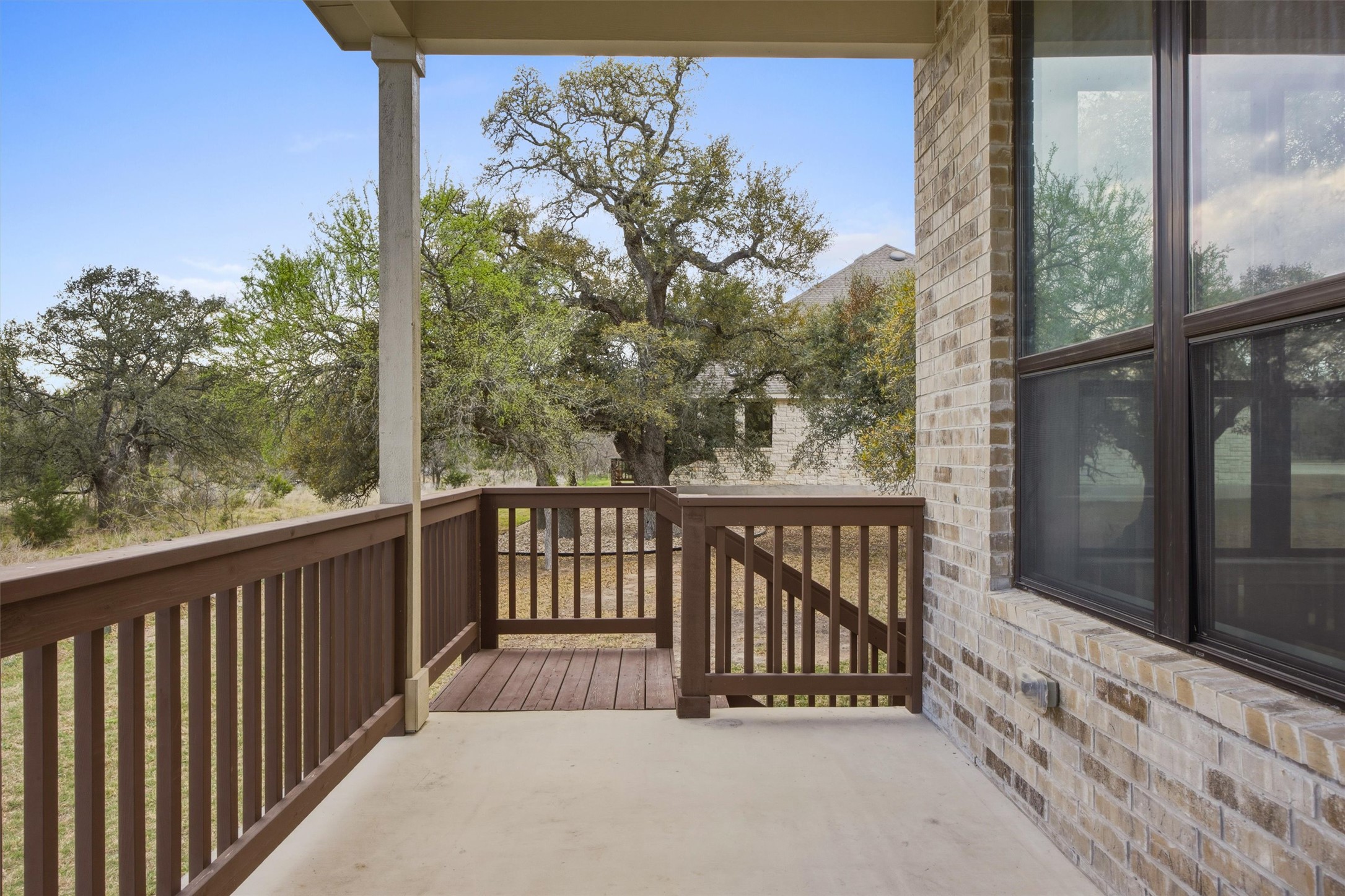 208 Tovas Secret Cove Georgetown, TX 78628 - Photo 35 of 40 a view of a balcony with a tree