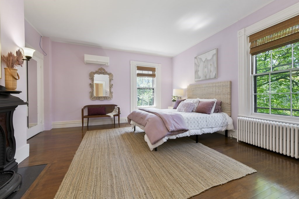 4 Berkeley Street Cambridge, MA 02138 - Photo 19 of 28 a bedroom with a bed and a window