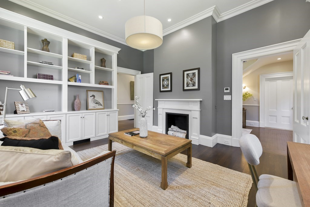 4 Berkeley Street Cambridge, MA 02138 - Photo 7 of 28 a living room with furniture and a fireplace