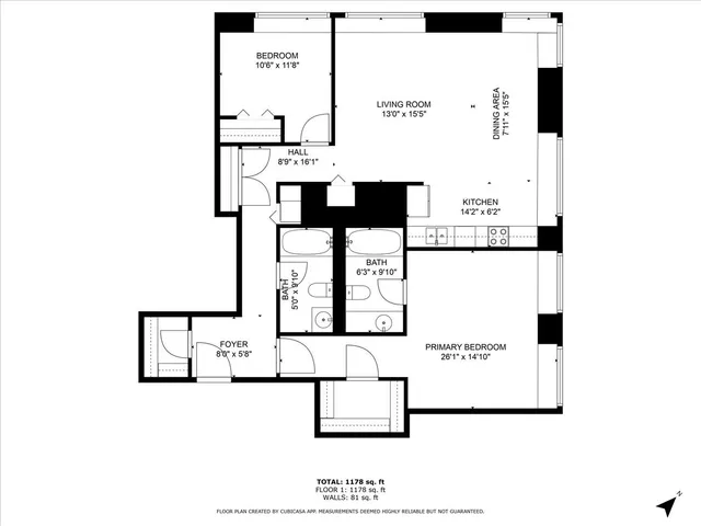 a picture of a bench in front of a wall