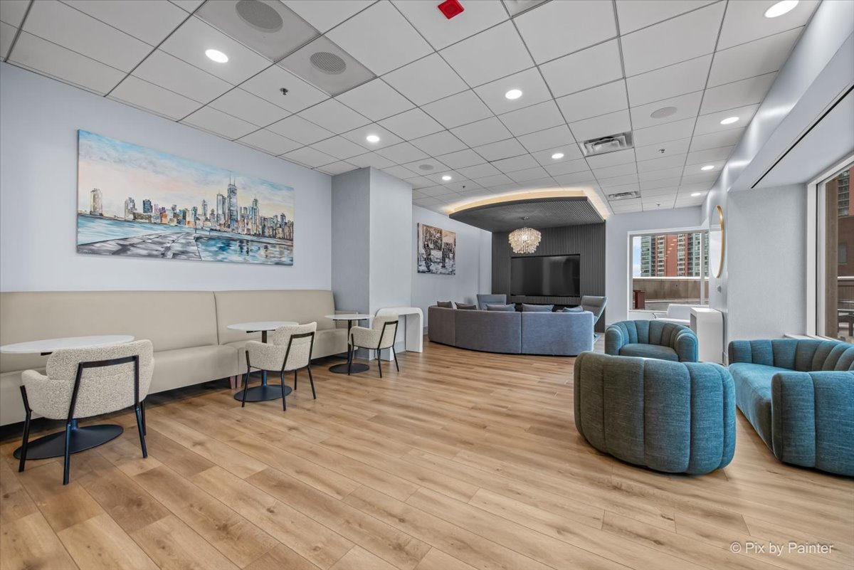 512 North McClurg Court, Unit 501 Chicago, IL 60611 - Photo 28 of 40 a living room with furniture and a wooden floor