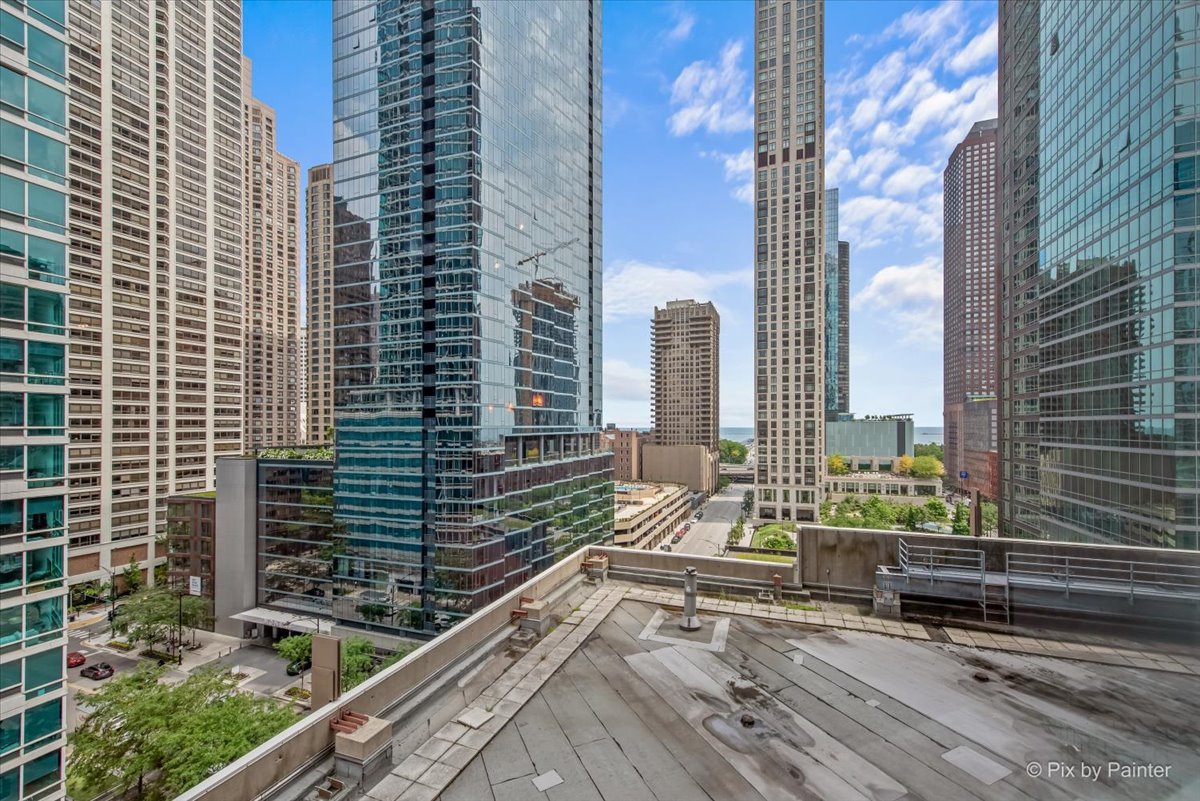 512 North McClurg Court, Unit 501 Chicago, IL 60611 - Photo 32 of 40 a view of balcony with two chairs and a rug