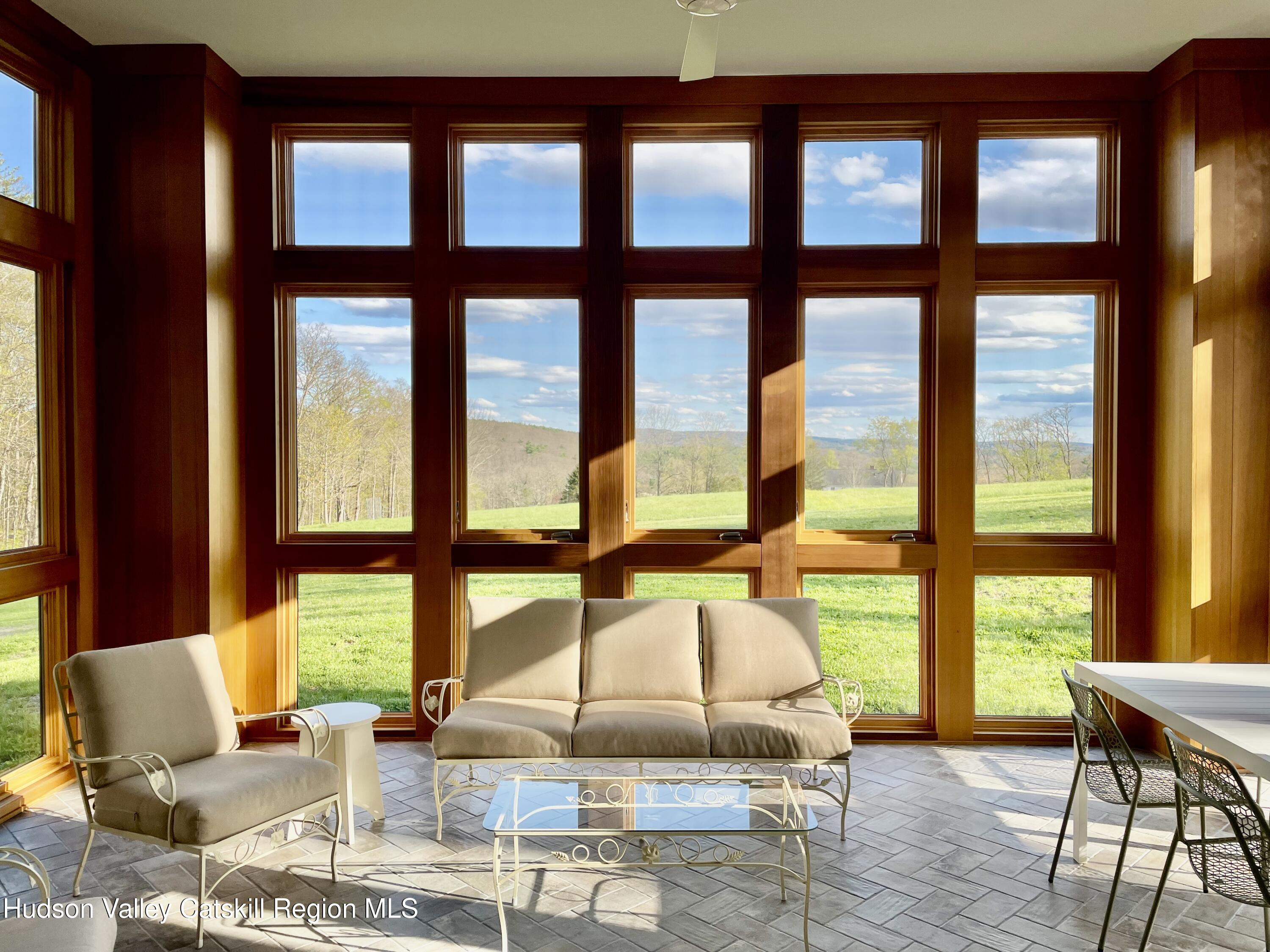 323 Haddock Hill Road Old Chatham, NY 12136 - Photo 8 of 22 6_cedar_screened_porch
