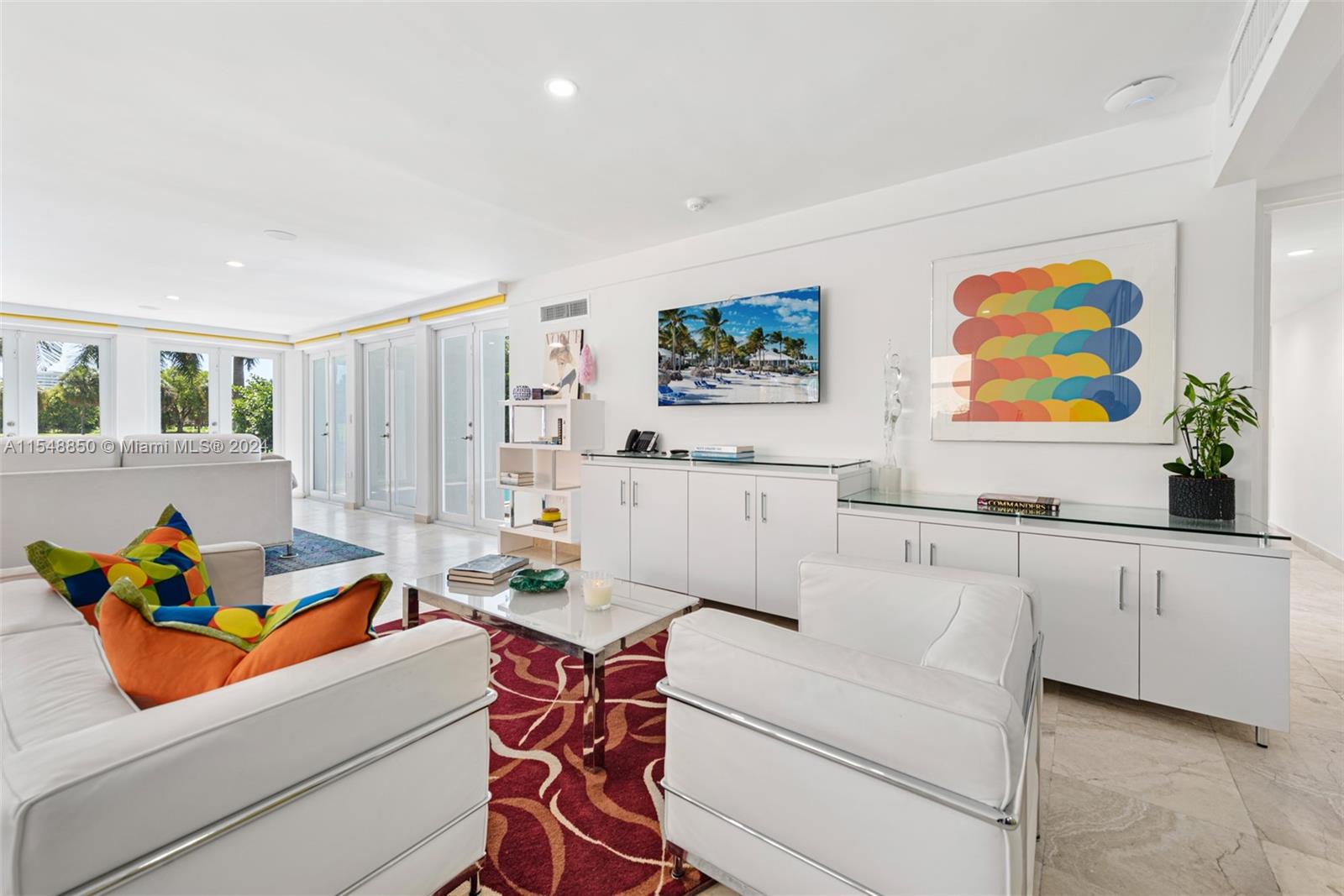 5301 Alton Road Miami Beach, FL 33140 - Photo 11 of 28 a living room with furniture and kitchen view