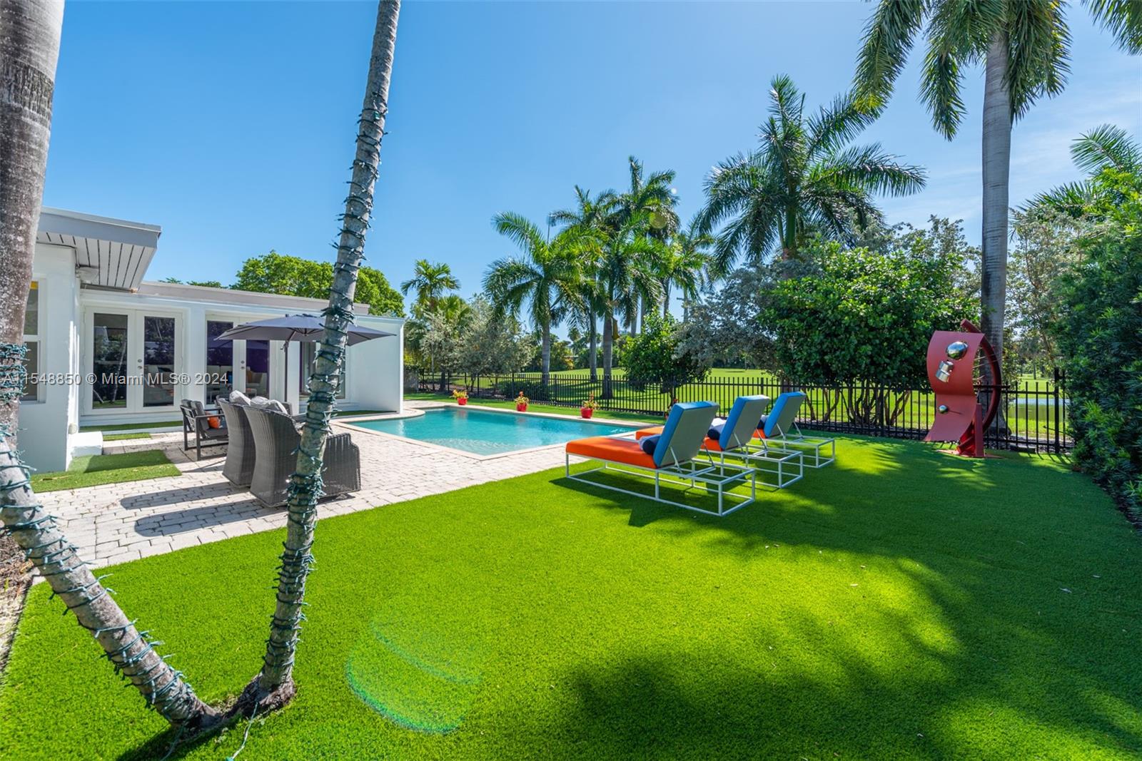 5301 Alton Road Miami Beach, FL 33140 - Photo 18 of 28 a view of a house with backyard