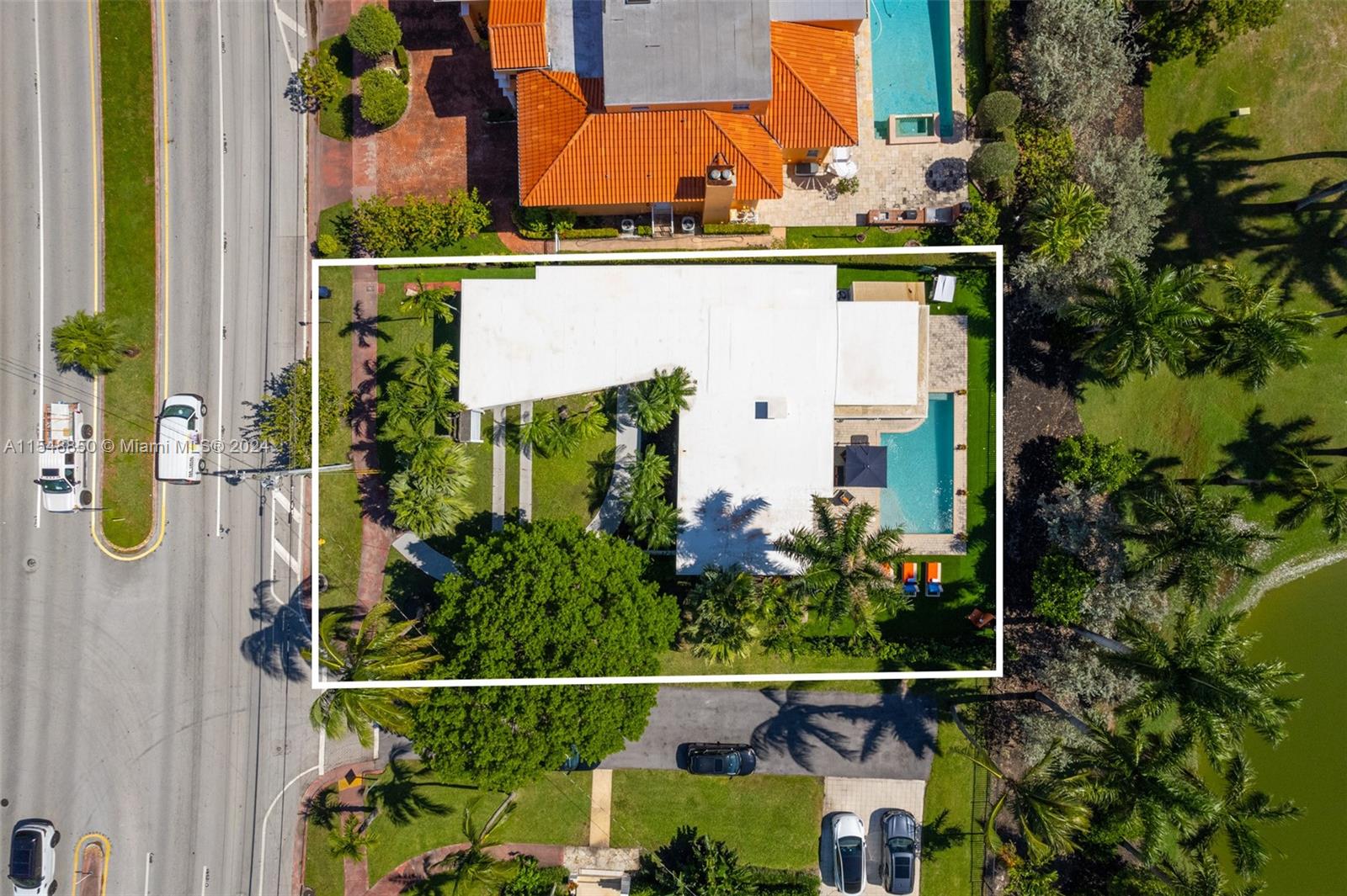 5301 Alton Road Miami Beach, FL 33140 - Photo 26 of 28 an aerial view of houses and roads