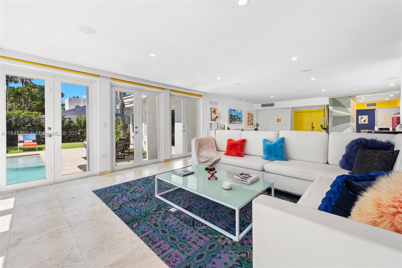 5301 Alton Road Miami Beach, FL 33140 - Photo 5 of 28 a living room with furniture and large window