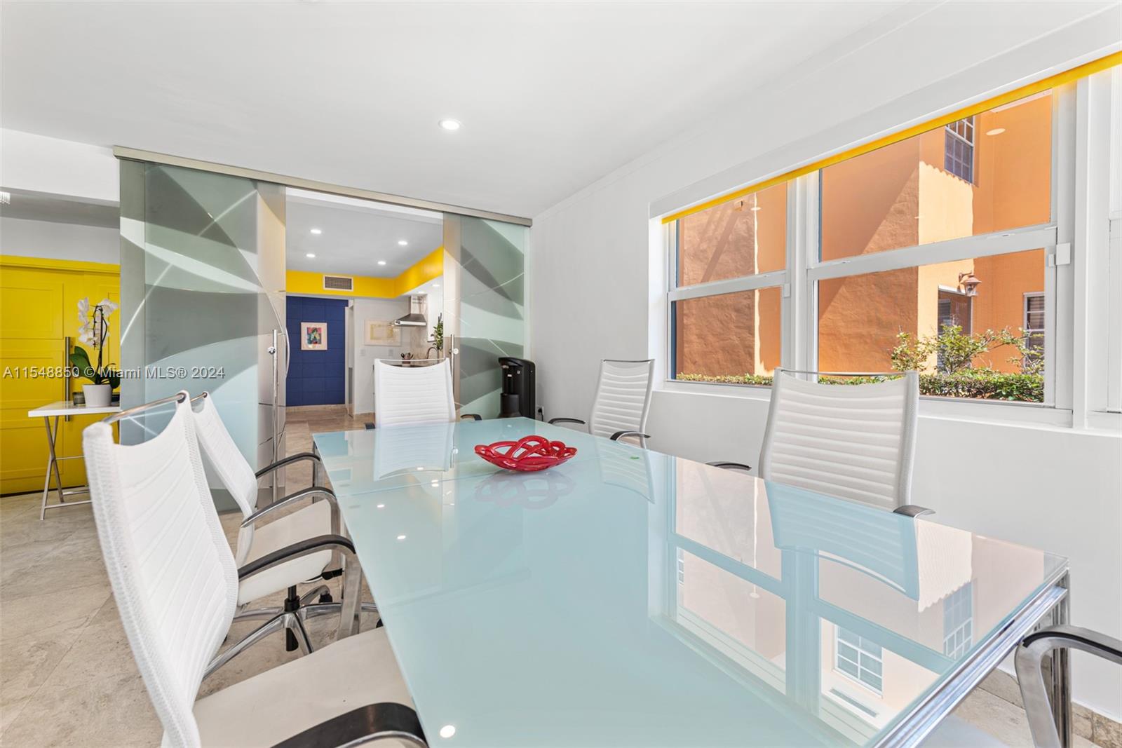 5301 Alton Road Miami Beach, FL 33140 - Photo 7 of 28 a view of an entryway and livingroom with furniture