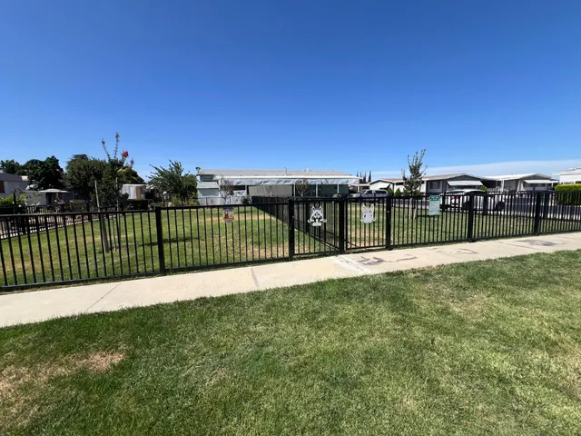 a view of building with a swimming pool