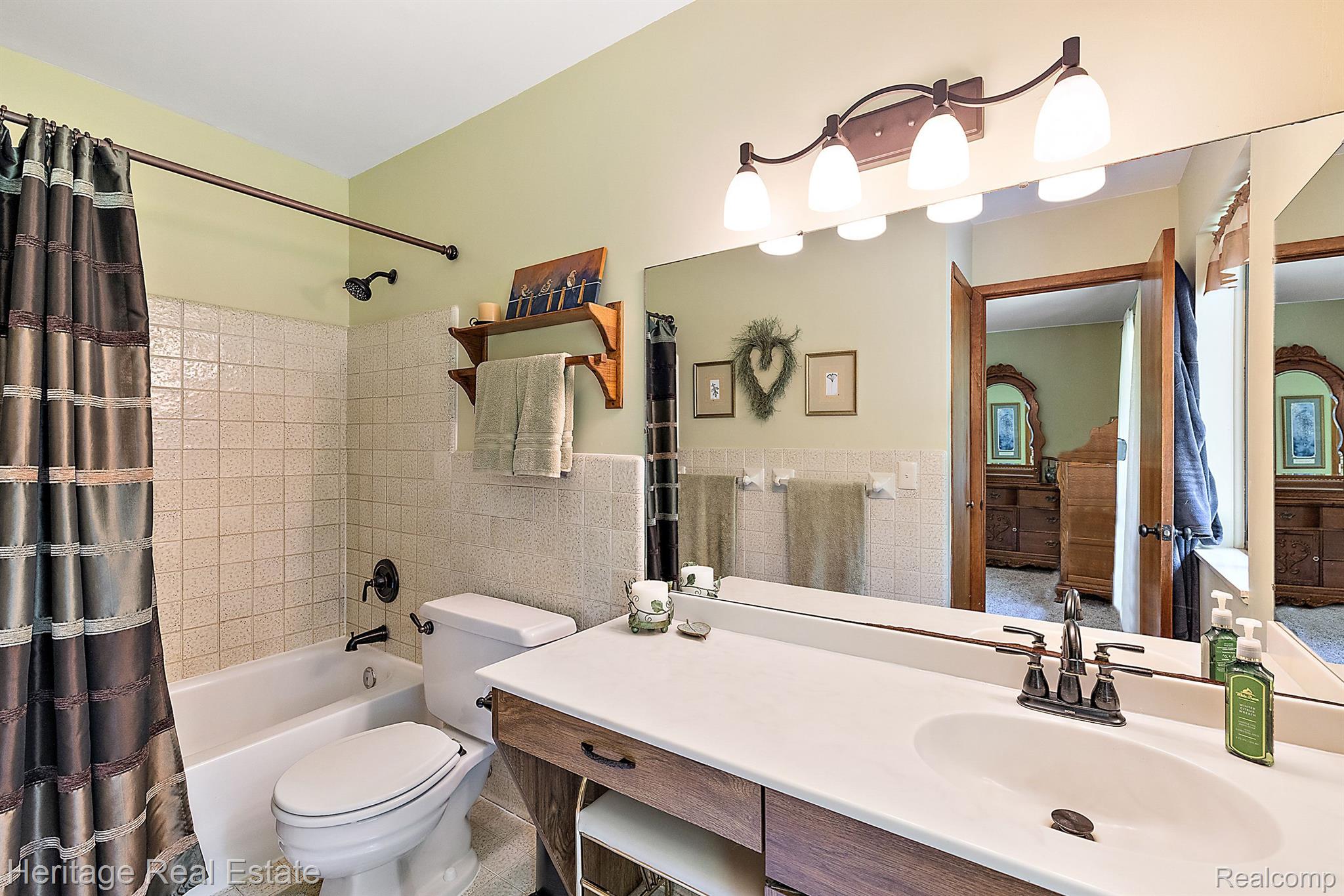 3190 West Brocker Road Metamora, MI 48455 - Photo 26 of 75 Main level primary bedroom suite w attached bath