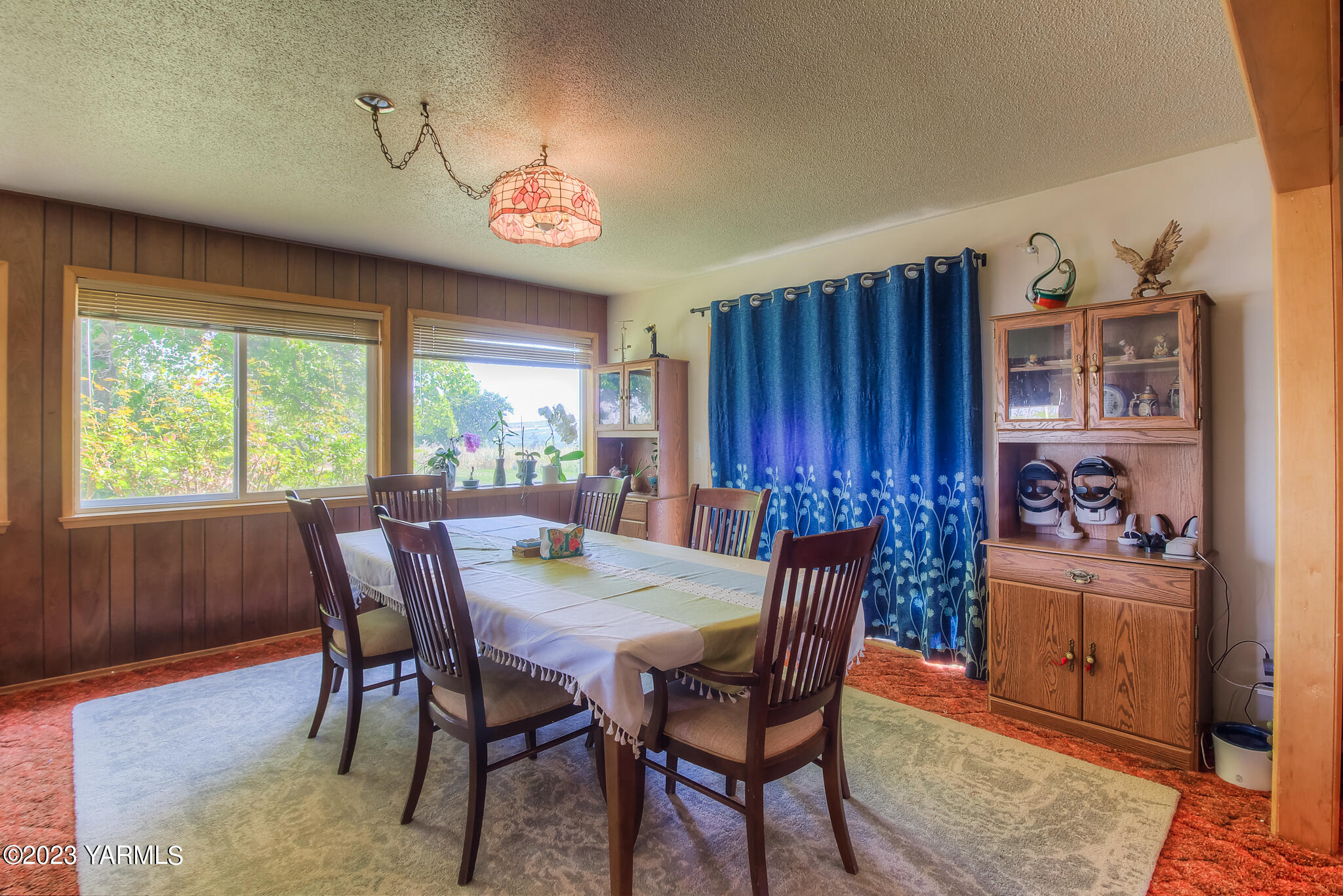 15451 Summitview Road Cowiche, WA 98923 - Photo 14 of 22 a view of a dining room with furniture window and wooden floor