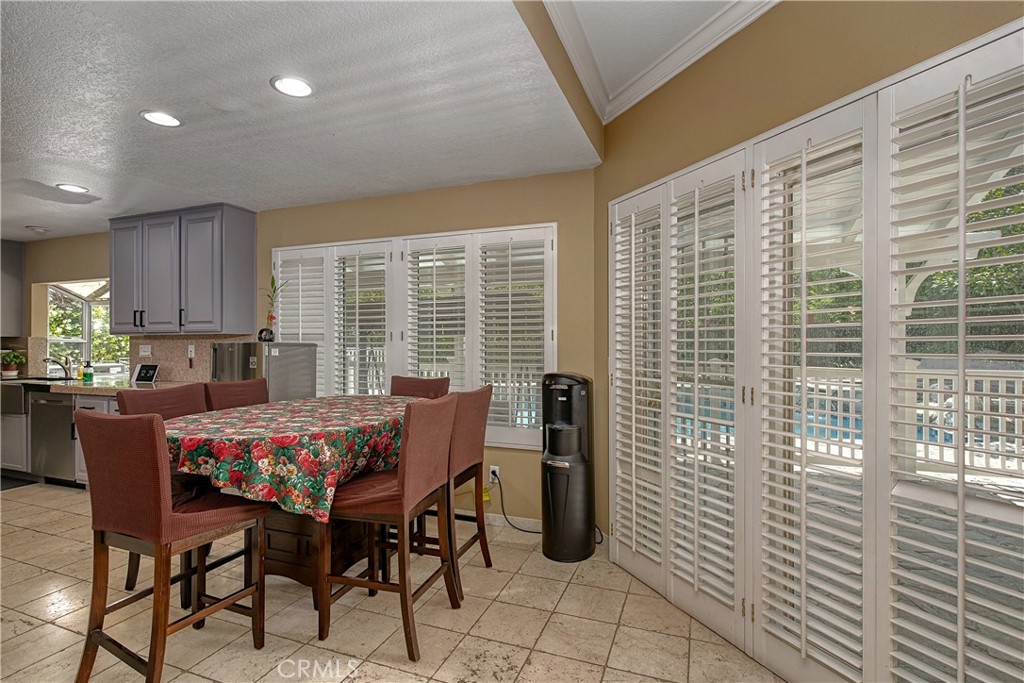23924 Clarington Drive West Hills, CA 91304 - Photo 11 of 40 a dining room with furniture and window