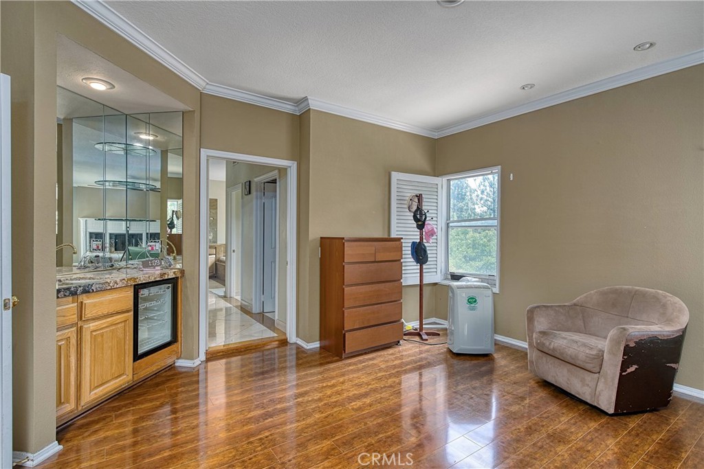 23924 Clarington Drive West Hills, CA 91304 - Photo 19 of 40 a living room with furniture and wooden floor