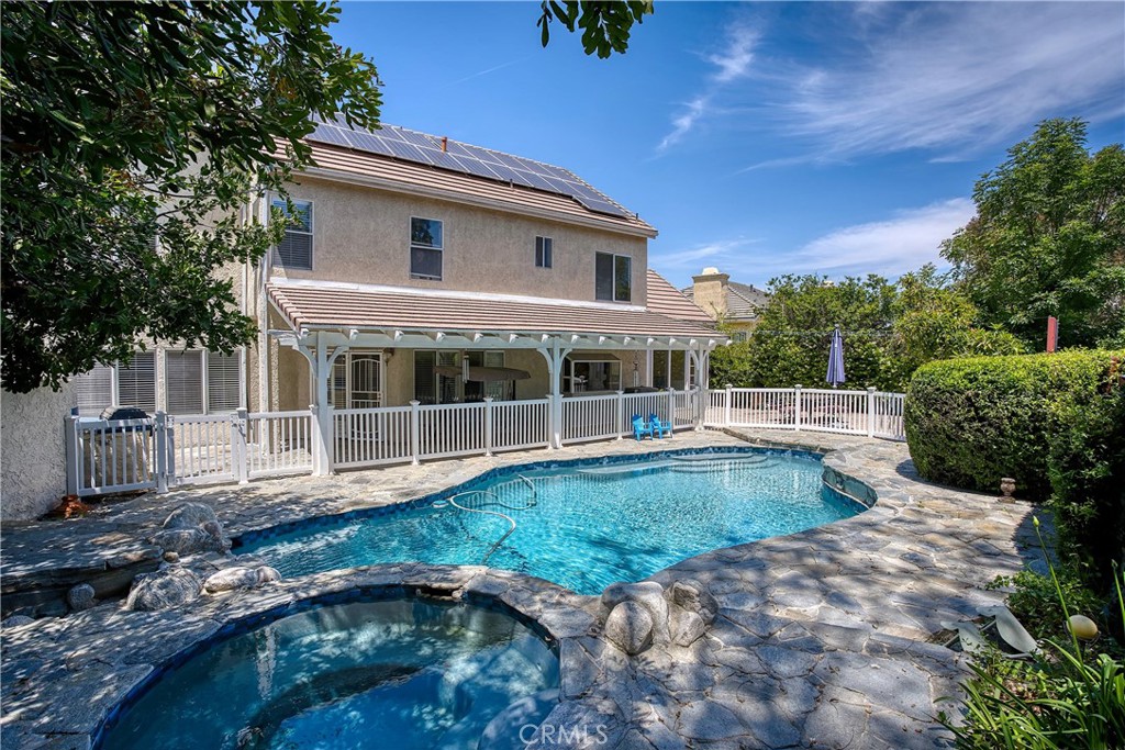 23924 Clarington Drive West Hills, CA 91304 - Photo 31 of 40 a view of a house with backyard and sitting area