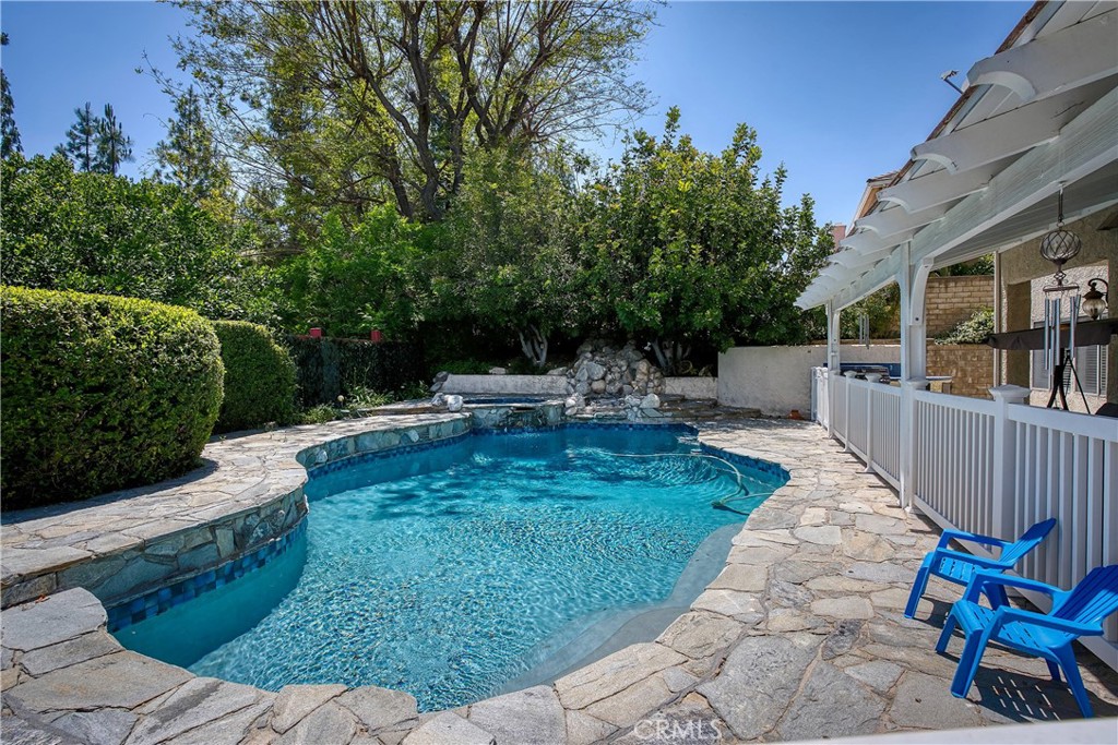 23924 Clarington Drive West Hills, CA 91304 - Photo 33 of 40 a view of a patio with chairs and plants