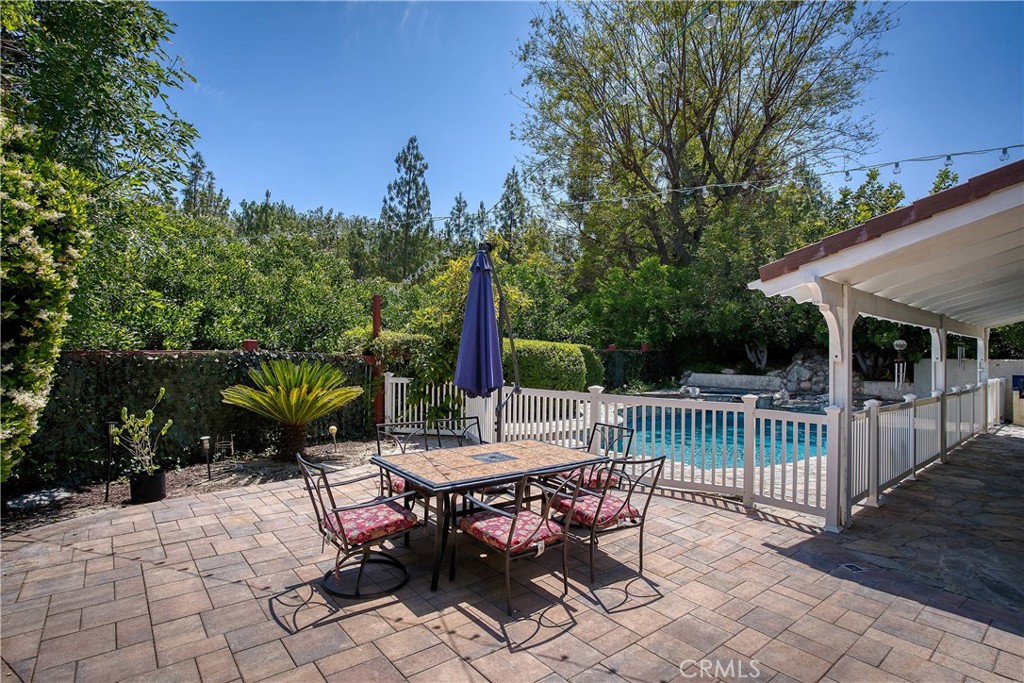 23924 Clarington Drive West Hills, CA 91304 - Photo 37 of 40 a view of a sitting area with furniture and wooden floor