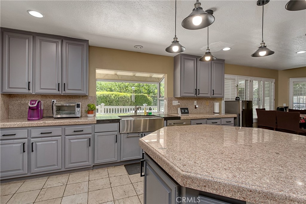 23924 Clarington Drive West Hills, CA 91304 - Photo 10 of 40 a kitchen with stainless steel appliances granite countertop counter space a sink and cabinets