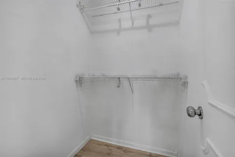 a view of a room with racks on the wall