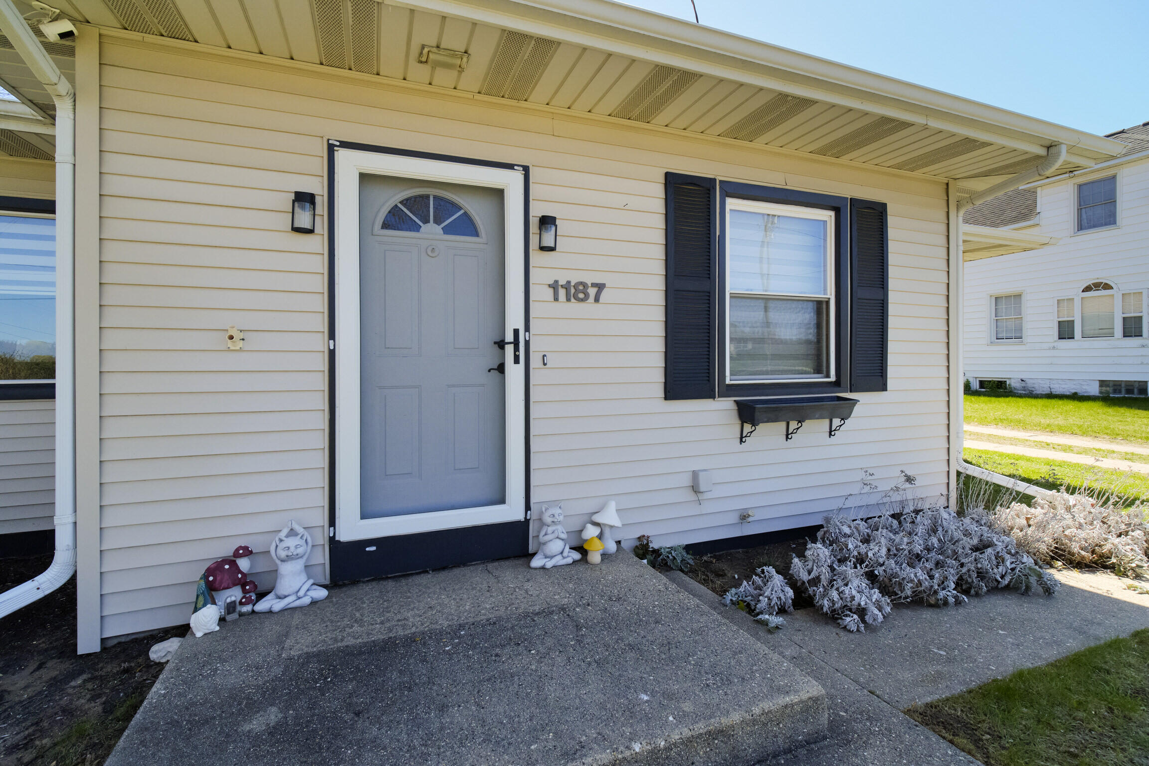 1187 Maple Road Manistee, MI 49660 - Photo 3 of 58 Front Door