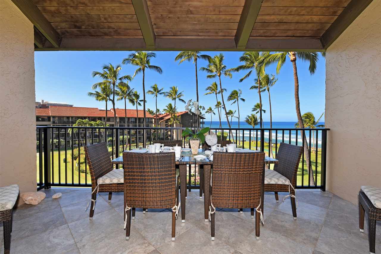 3543 Lower Honoapiilani Road, Unit B405 Lahaina, HI 96761 - Photo 30 of 30 a view of a chairs and table in patio
