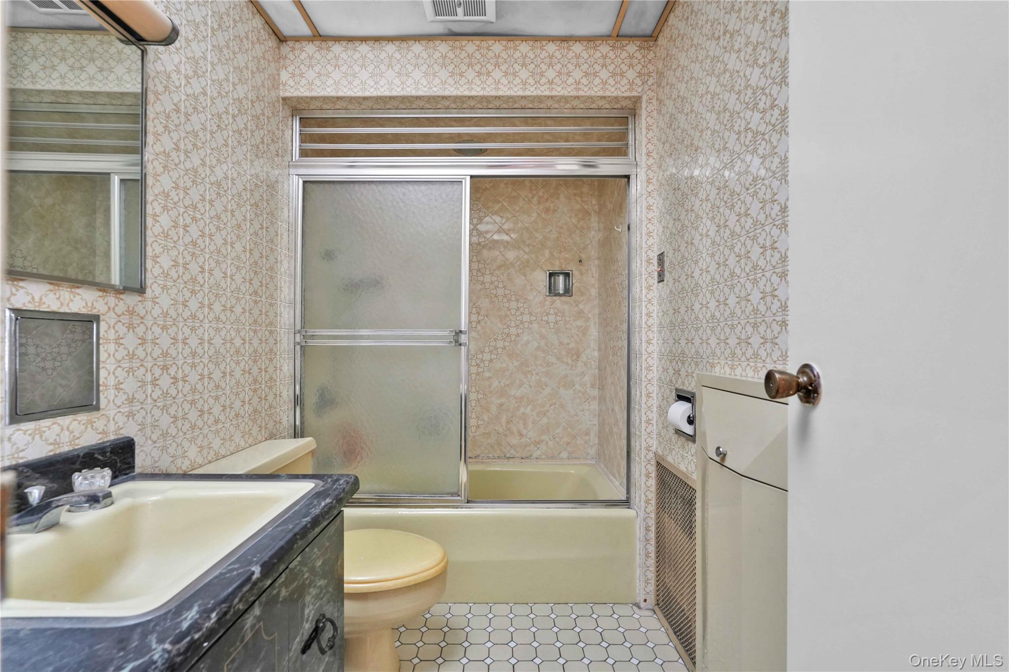 42-01 Newtown Road Queens, NY 11103 - Photo 14 of 27 a bathroom with a sink toilet and shower