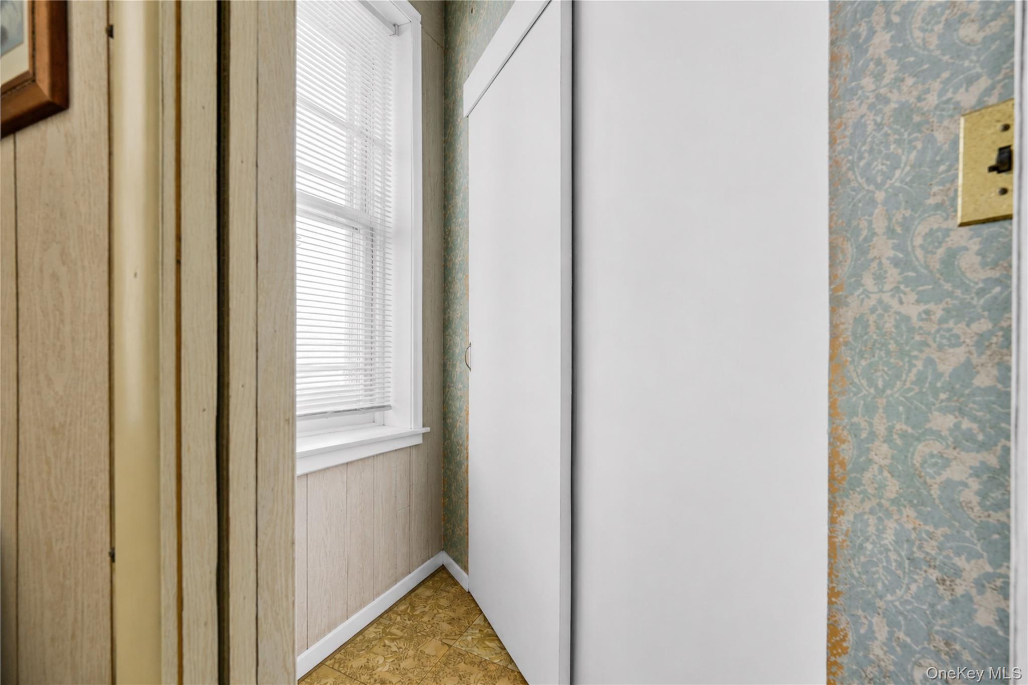 42-01 Newtown Road Queens, NY 11103 - Photo 17 of 27 a view of a bathroom from the hallway