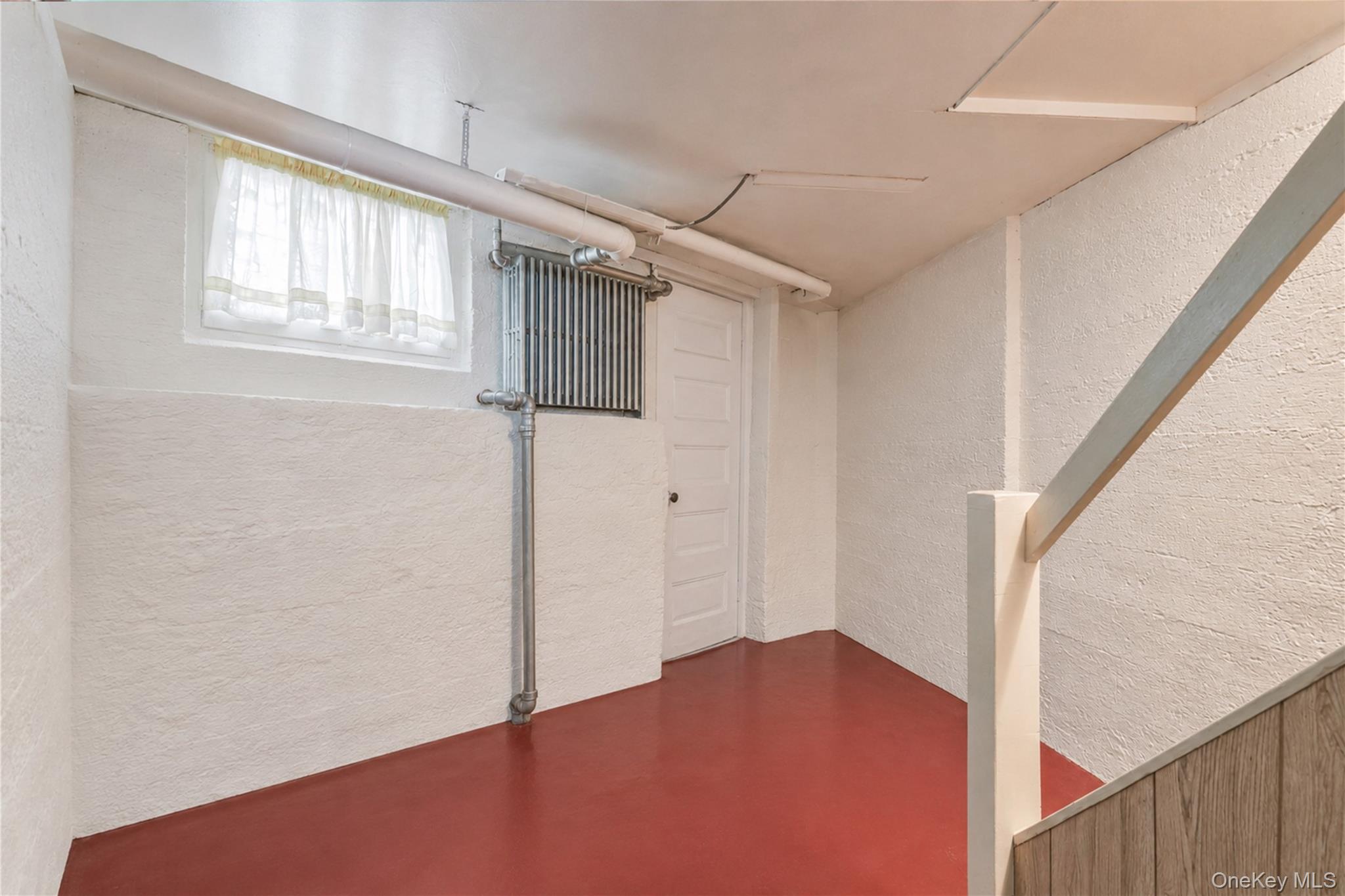 42-01 Newtown Road Queens, NY 11103 - Photo 23 of 27 a view of hallway with windows