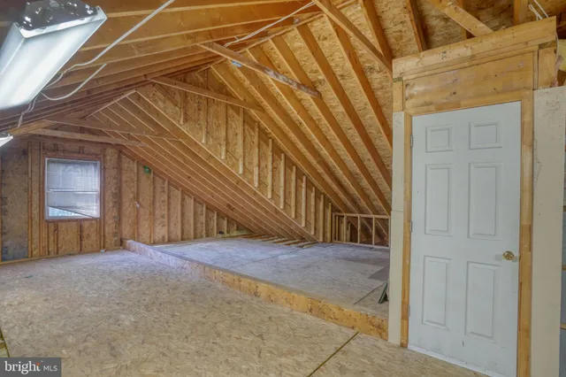 a view of backyard with garage
